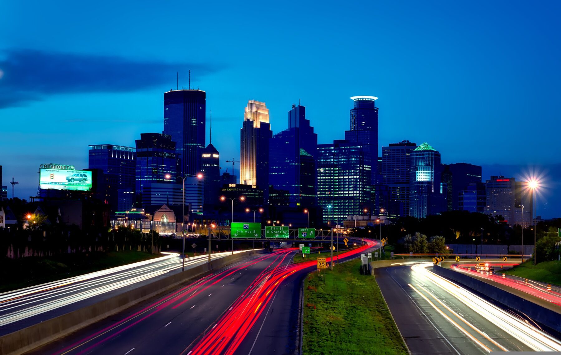 Aerial view of Minneapolis cityscape with highways and urban infrastructure